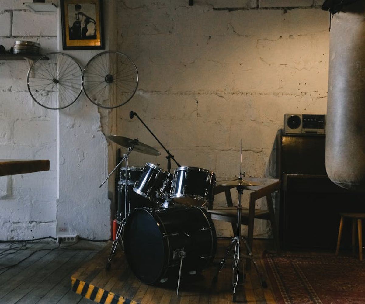 Person meditatively moving in a modern loft studio space